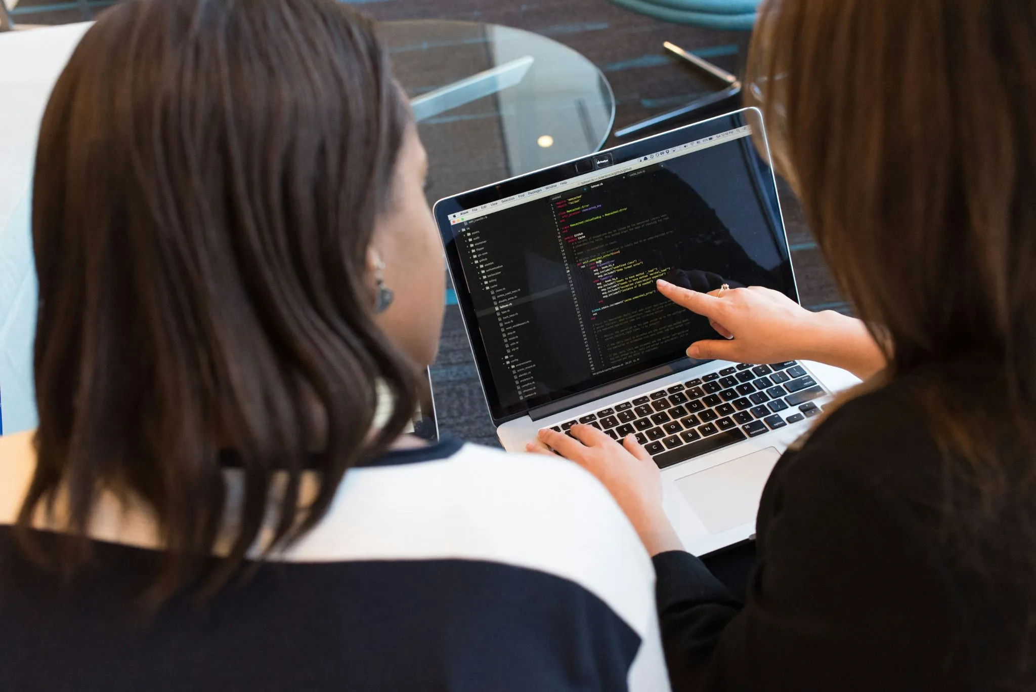 Professionals working on a laptop