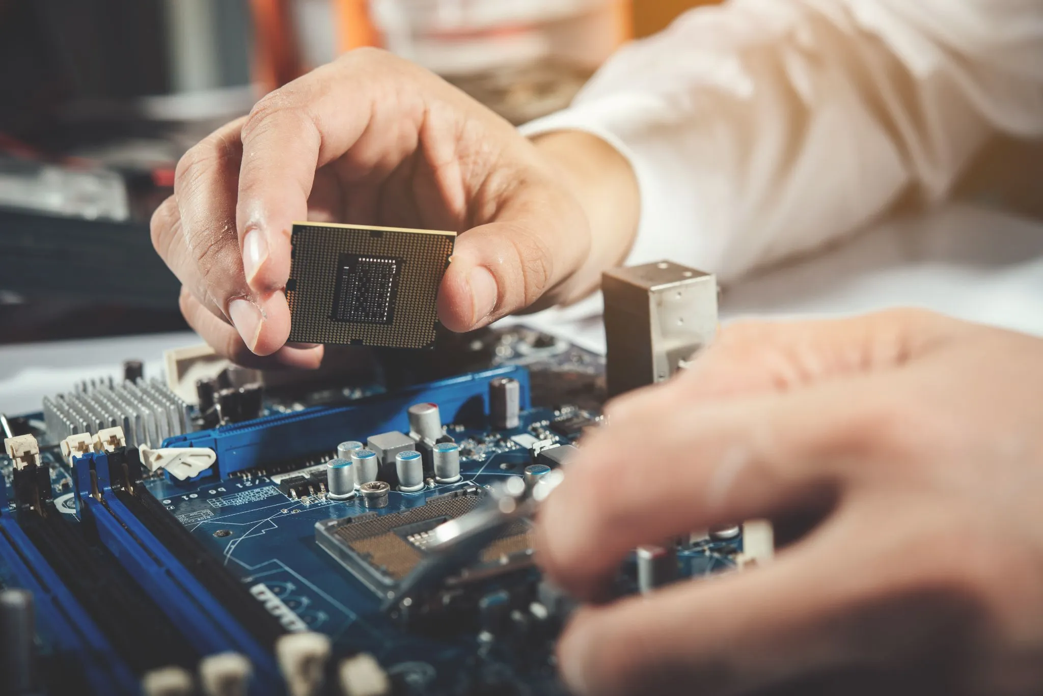 Technician inspecting computer hardware